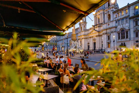 Camillo tables in Piazza Navona at dusk